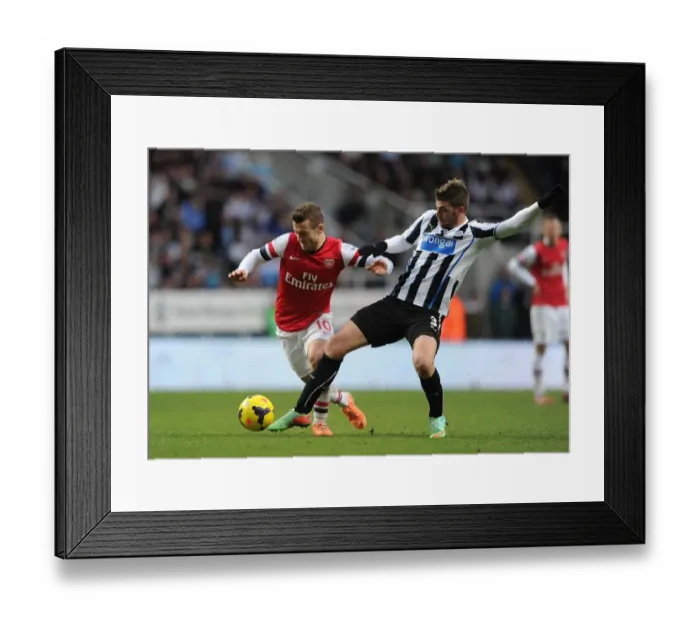 Framed Print : Jack Wilshere Outmaneuvers Mathieu Debuchy: Newcastle United vs. Arsenal, Premier League 2013-14