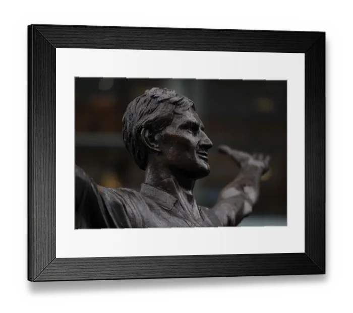 Framed Print : Tony Adams: Arsenal's Legendary Captain Honored with Statue at Emirates Stadium