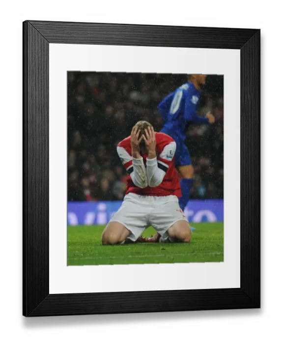 Framed Print : Heartbreaking Miss: Per Mertesacker's Agonizing Header at Arsenal vs. Cardiff City