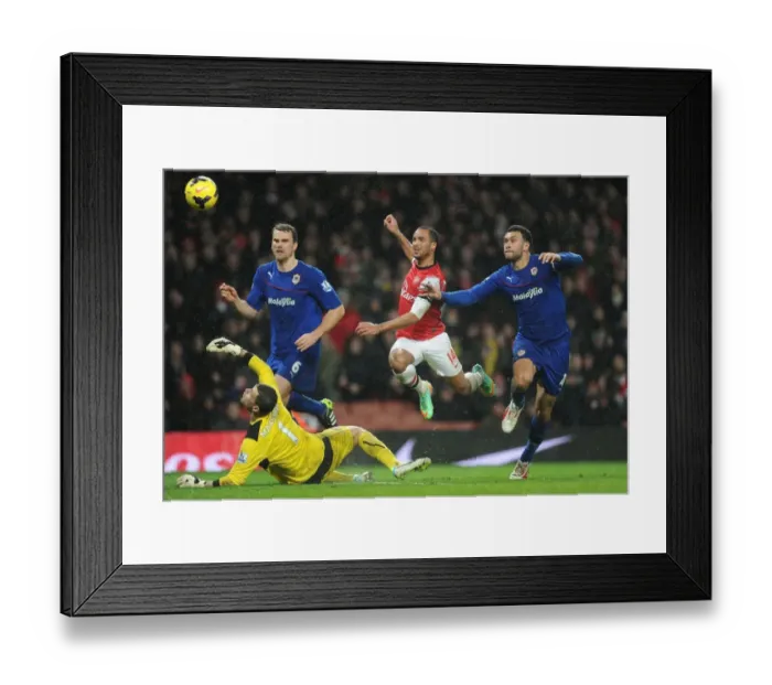 Framed Print : Theo Walcott's Epic Chip Over David Marshall: Arsenal's Winning Goal vs Cardiff City (2013-14)