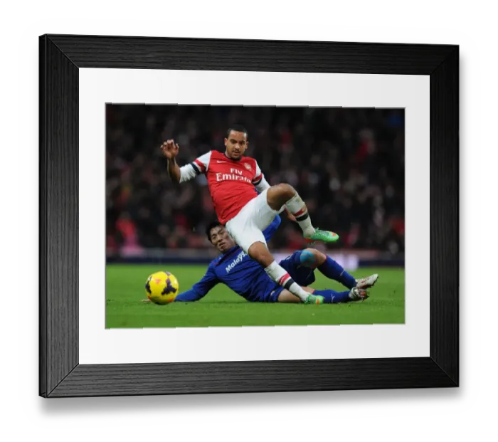 Framed Print : Theo Walcott vs Bo-Kyung Kim: A Premier League Showdown at Arsenal Framed Print : Theo Walcott vs Bo-Kyung Kim: A Premier League Showdown at Arsenal