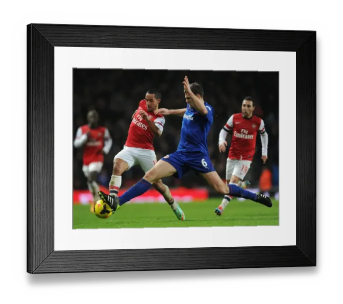 Framed Print : Theo Walcott vs Ben Turner: Intense Battle at the Emirates - Arsenal vs Cardiff City, Premier League 2013-14 Framed Print : Theo Walcott vs Ben Turner: Intense Battle at the Emirates - Arsenal vs Cardiff City, Premier League 2013-14
