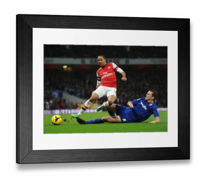 Framed Print : Theo Walcott vs Ben Turner: A Footballing Battle at the Emirates - Arsenal vs Cardiff City, Premier League 2013-14 Framed Print : Theo Walcott vs Ben Turner: A Footballing Battle at the Emirates - Arsenal vs Cardiff City, Premier League 2013-14