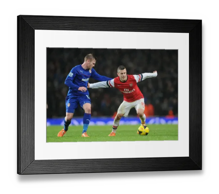 Framed Print : Jack Wilshere vs Aron Gunnarsson: Battle in Midfield - Arsenal v Cardiff City, Premier League Framed Print : Jack Wilshere vs Aron Gunnarsson: Battle in Midfield - Arsenal v Cardiff City, Premier League