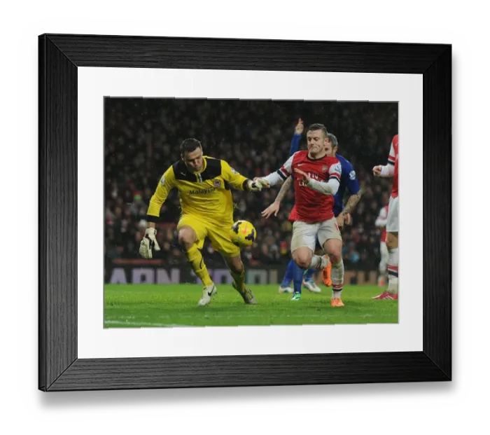 Framed Print : Jack Wilshere vs. David Marshall: Intense Battle at Arsenal's Emirates Stadium (Arsenal v Cardiff City, 2013-14) Framed Print : Jack Wilshere vs. David Marshall: Intense Battle at Arsenal's Emirates Stadium (Arsenal v Cardiff City, 2013-14)