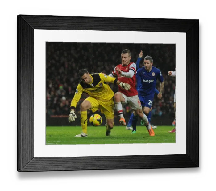 Framed Print : Jack Wilshere vs. David Marshall: A Fierce Battle in the Premier League - Arsenal vs. Cardiff City Showdown