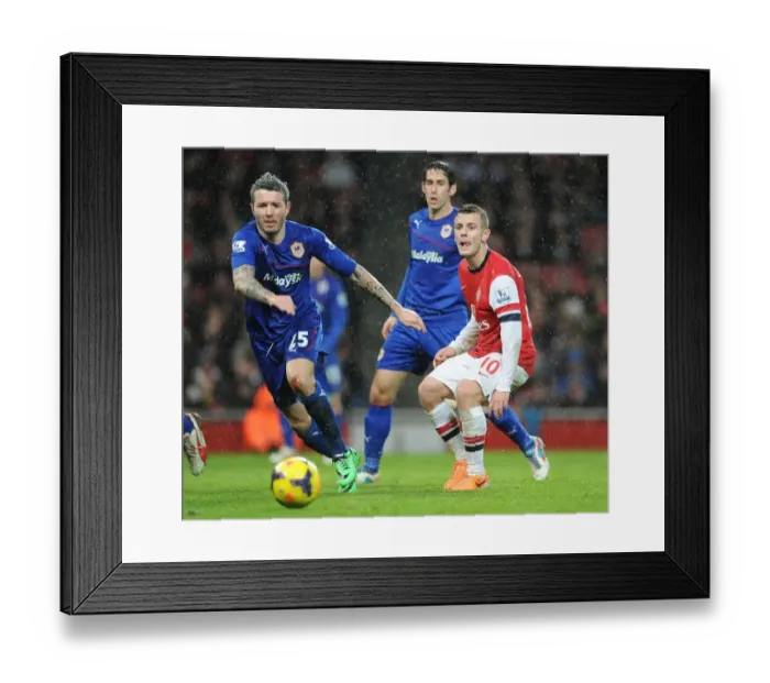 Framed Print : Jack Wilshere vs. Kevin McNaughton: Intense Battle at Arsenal vs. Cardiff City (2013-14) Framed Print : Jack Wilshere vs. Kevin McNaughton: Intense Battle at Arsenal vs. Cardiff City (2013-14)
