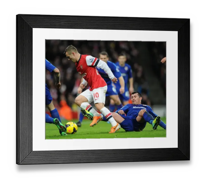 Framed Print : Intense Rivalry: Wilshere vs. Medel - Arsenal's Battle with Cardiff City Framed Print : Intense Rivalry: Wilshere vs. Medel - Arsenal's Battle with Cardiff City