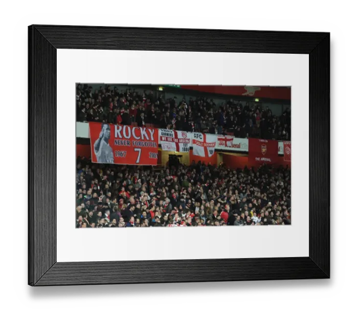Framed Print : Arsenal fans flags before the match. Arsenal 2: 0 Tottenham Hotspur. FA Cup 3rd Round