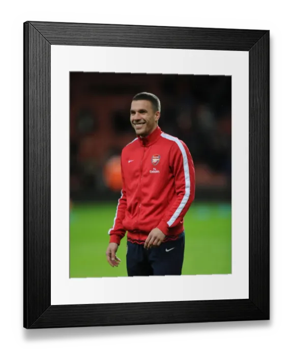 Framed Print : Lukas Podolski Prepares for Arsenal-Tottenham FA Cup Clash