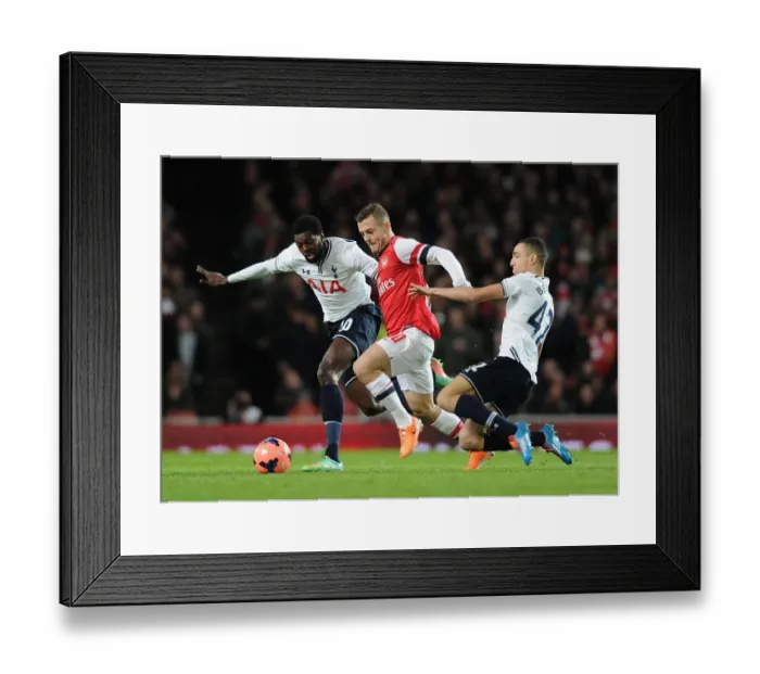 Framed Print : Arsenal vs. Tottenham: Wilshere Clashes with Adebayor and Bentaleb in FA Cup Third Round