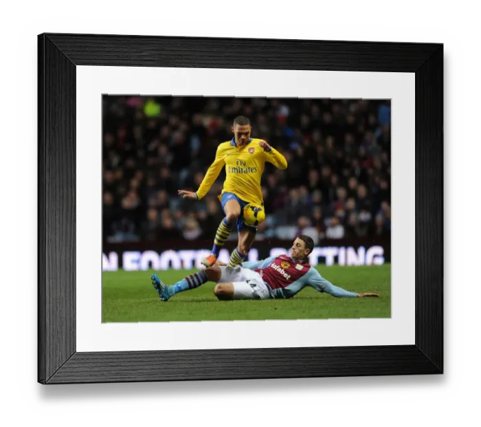 Framed Print : Arsenal's Kieran Gibbs Faces Pressure from Aston Villa's Matthew Lowton in Premier League Clash