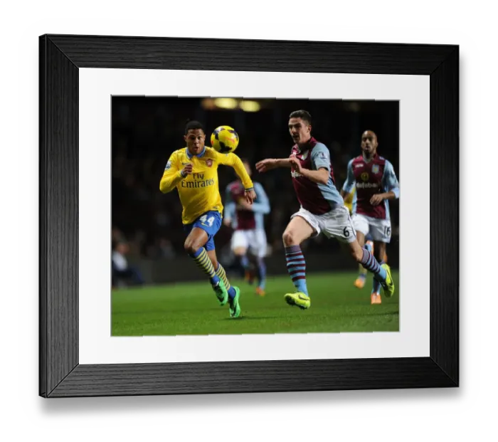 Framed Print : Serge Gnabry Closes In on Ciaran Clark - Aston Villa vs Arsenal, Premier League 2013-14