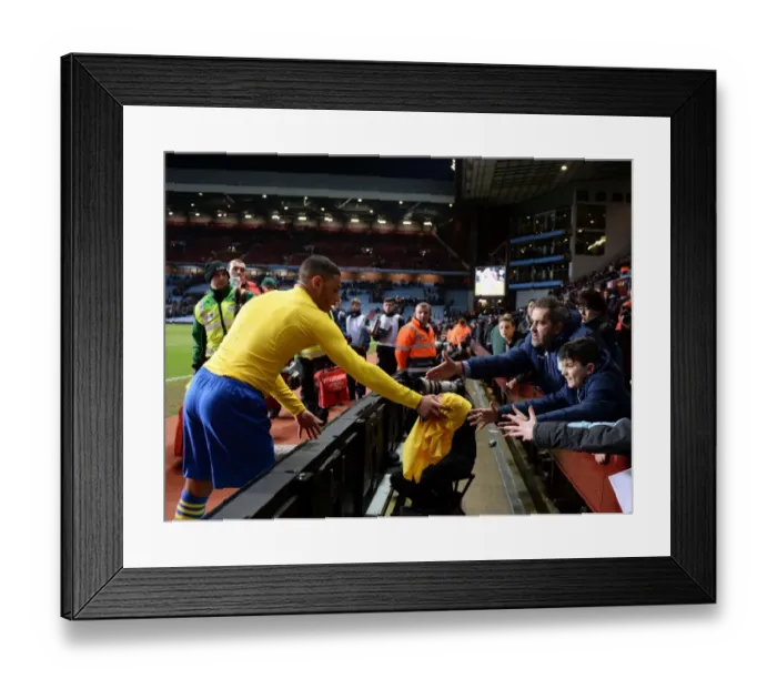 Framed Print : Alex Oxlade-Chamberlain's Heartfelt Gesture: Aston Villa vs. Arsenal, Premier League 2013-14