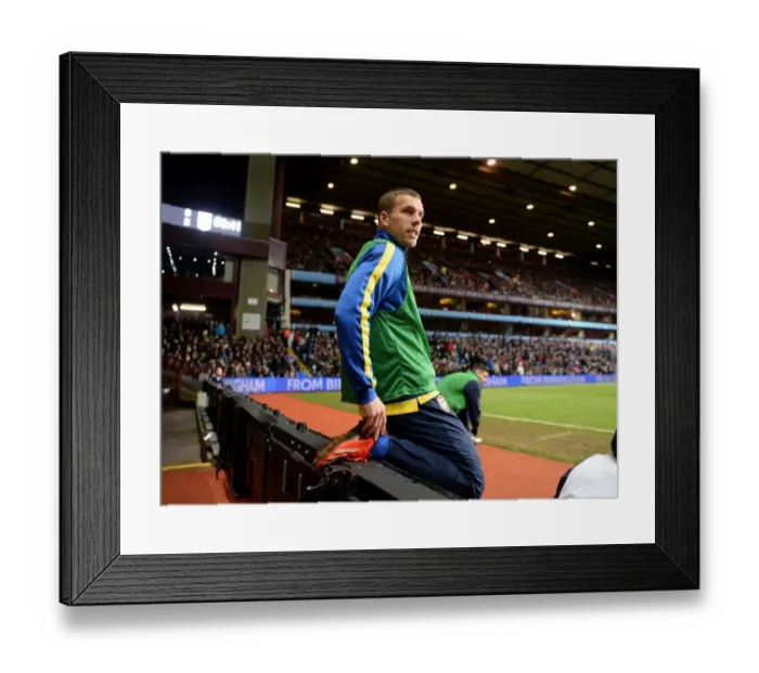 Framed Print : Arsenal's Lukas Podolski Prepares for Aston Villa Showdown, Premier League 2013-14 Framed Print : Arsenal's Lukas Podolski Prepares for Aston Villa Showdown, Premier League 2013-14