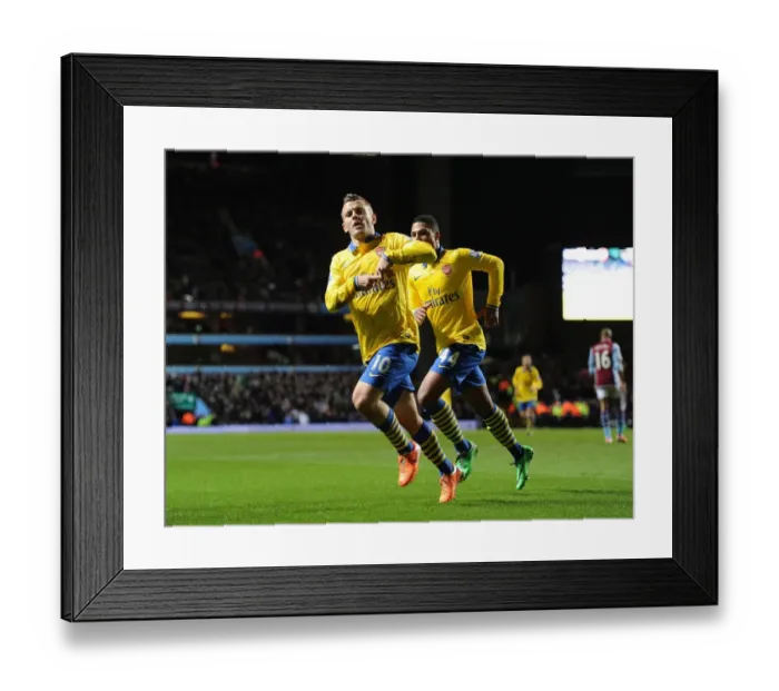 Framed Print : Jack Wilshere Scores the Opener: Aston Villa vs. Arsenal, Premier League 2013-14 - A Celebratory Moment Framed Print : Jack Wilshere Scores the Opener: Aston Villa vs. Arsenal, Premier League 2013-14 - A Celebratory Moment