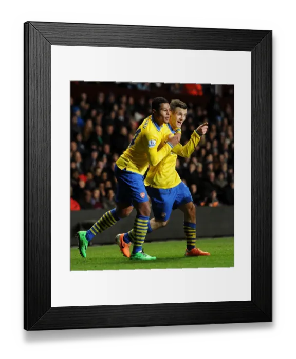 Framed Print : Jack Wilshere Scores the Opener: Arsenal's Triumph at Aston Villa, Premier League 2013-14