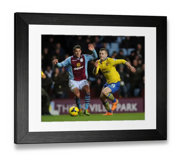 Framed Print : Jack Wilshere vs. Ashley Westwood: Battle in the Midfield - Aston Villa vs. Arsenal, Premier League 2013-14
