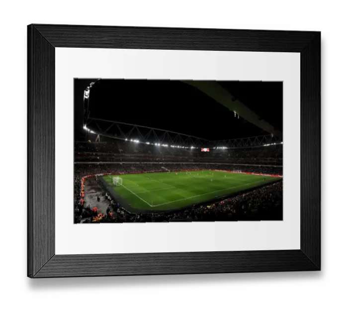 Framed Print : Arsenal Fans Light Up Emirates Stadium with Glowing Tribute during FA Cup Match against Coventry City