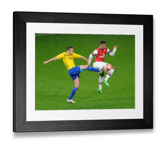 Framed Print : Serge Gnabry vs Blair Adams: Intense Battle at Arsenal's Emirates Stadium - FA Cup Fourth Round, 2014 Framed Print : Serge Gnabry vs Blair Adams: Intense Battle at Arsenal's Emirates Stadium - FA Cup Fourth Round, 2014