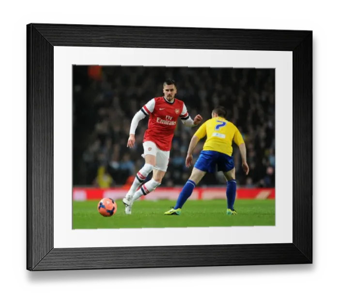 Framed Print : Arsenal's Carl Jenkinson Fends Off Coventry's John Fleck in FA Cup Clash Framed Print : Arsenal's Carl Jenkinson Fends Off Coventry's John Fleck in FA Cup Clash