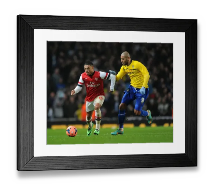 Framed Print : Arsenal's Alex Oxlade-Chamberlain Outpaces Coventry's Leon Clarke in FA Cup Clash