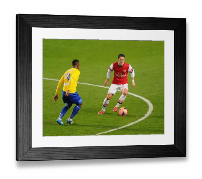 Framed Print : Mesut Ozil vs Franck Moussa: Arsenal vs Coventry City FA Cup Clash Framed Print : Mesut Ozil vs Franck Moussa: Arsenal vs Coventry City FA Cup Clash