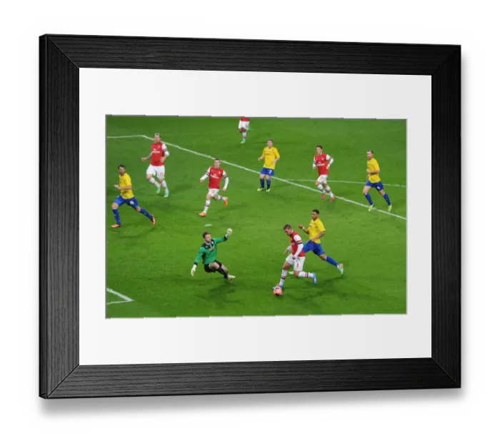 Framed Print : Lukas Podolski Scores Dramatic Goal Past Joe Murphy Against Coventry City in FA Cup Fourth Round Framed Print : Lukas Podolski Scores Dramatic Goal Past Joe Murphy Against Coventry City in FA Cup Fourth Round
