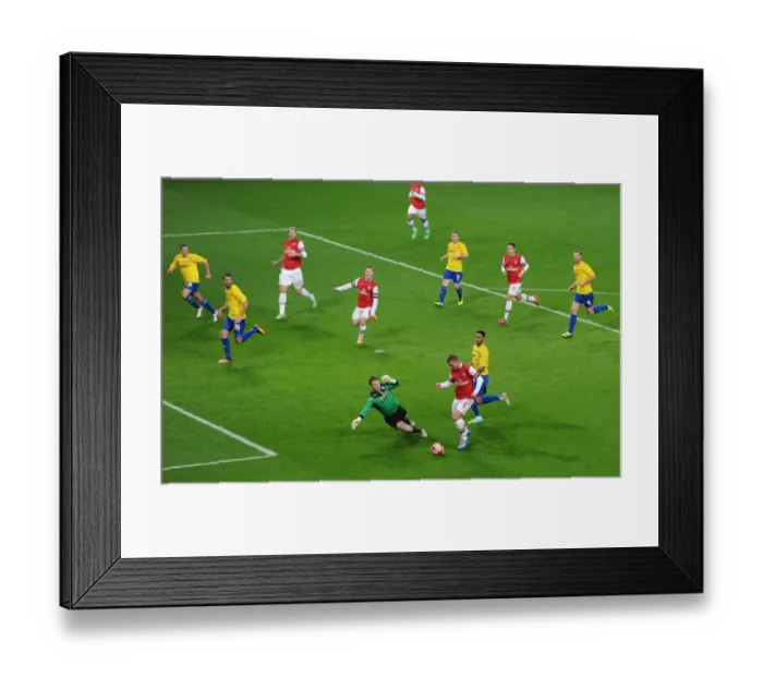 Framed Print : Podolski's Dramatic FA Cup Goal: Outmaneuvering Murphy for Arsenal's Victory over Coventry City