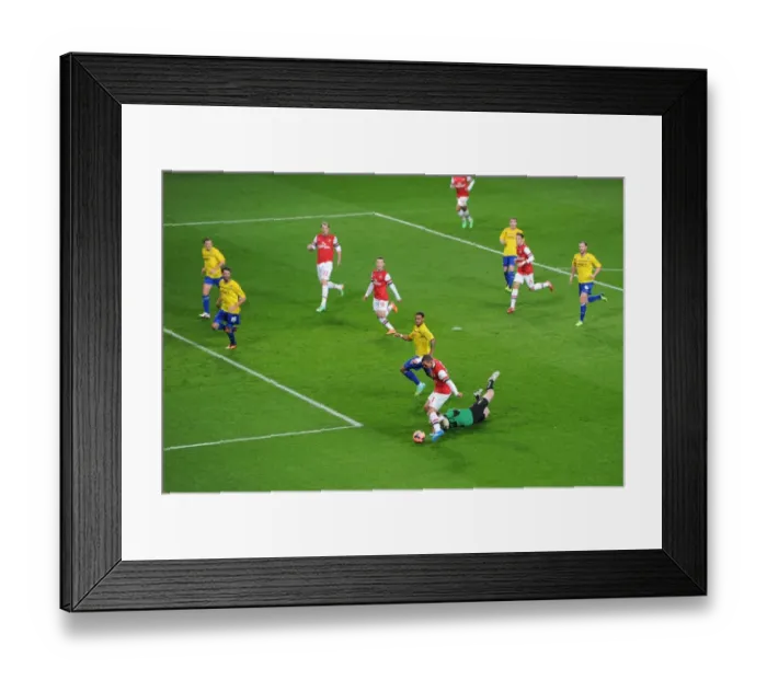 Framed Print : Podolski's Dramatic Goal: Arsenal's FA Cup Victory Over Coventry City (2014) - Lukas Podolski Scores Past Joe Murphy