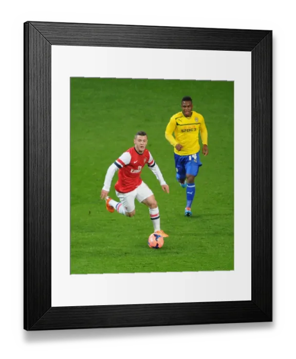 Framed Print : Jack Wilshere Outruns Franck Moussa in FA Cup Clash: Arsenal vs Coventry City, 2014 Framed Print : Jack Wilshere Outruns Franck Moussa in FA Cup Clash: Arsenal vs Coventry City, 2014