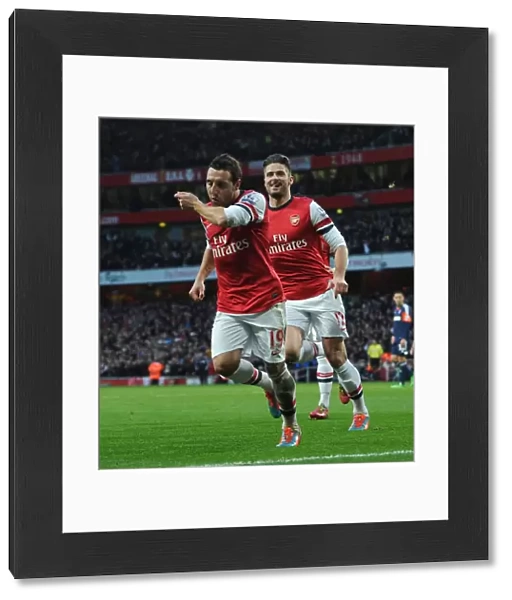 Santi Cazorla celebrates scoring his and Arsenals 1st goal with Olivier Giroud. Arsenal 2: 0 Fulham