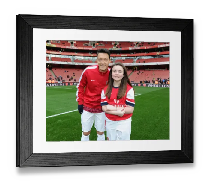 Framed Print : Arsenal mascot with Mesut Ozil (Arsenal). Arsenal 2: 0 Fulham. Barclays Premier League