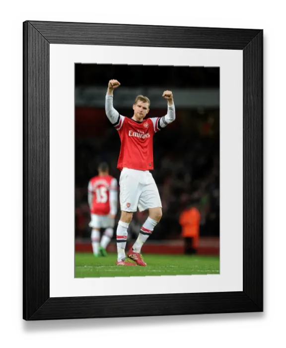 Framed Print : Per Mertesacker's Triumph: Arsenal's Victory over Fulham (2013-14)