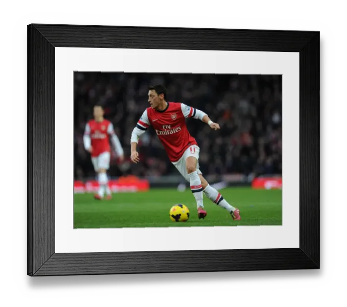 Framed Print : Mesut Ozil: Arsenal's Star Midfielder in Action Against Fulham, Premier League 2013-14