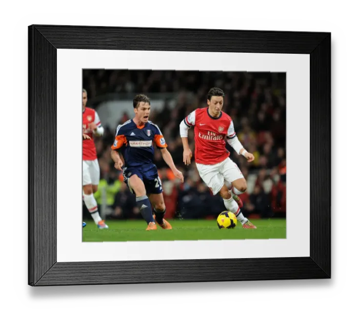 Framed Print : Mesut Ozil vs. Scott Parker: Clash at the Emirates - Arsenal v Fulham, Premier League 2013-14
