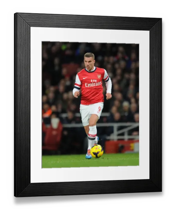 Framed Print : Podolski Scores Twice: Arsenal Defeats Fulham 2-0 in Premier League (18 / 01 / 14)
