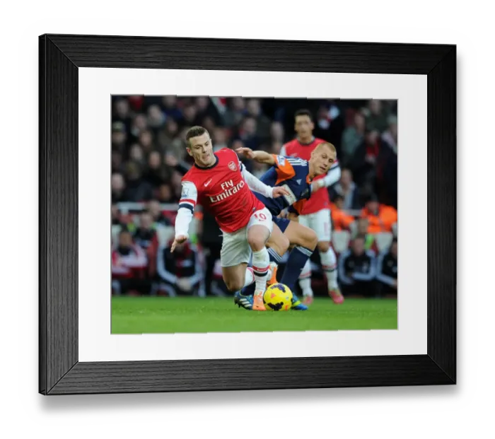 Framed Print : Arsenal's Jack Wilshere Clashes with Fulham's Steve Sidwell in Premier League Showdown