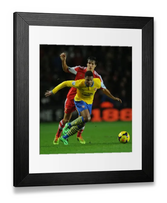 Framed Print : Serge Gnabry Outmaneuvers Jack Cork: Southampton vs Arsenal, Premier League 2013-14 Framed Print : Serge Gnabry Outmaneuvers Jack Cork: Southampton vs Arsenal, Premier League 2013-14