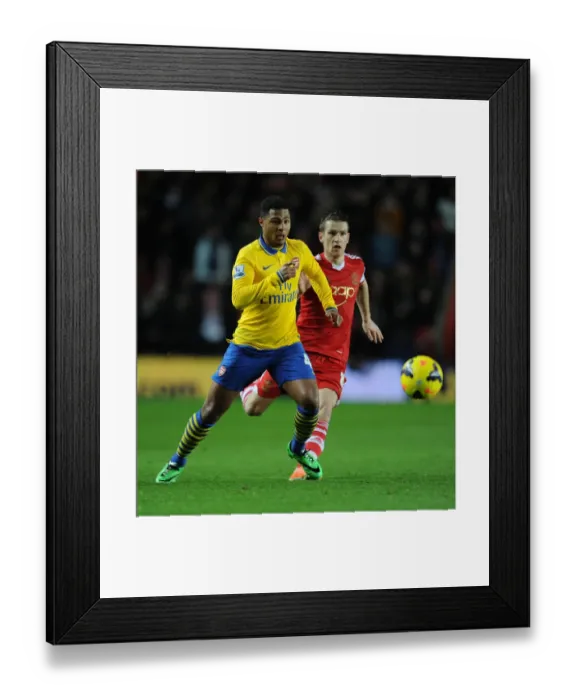 Framed Print : Intense Battle: Serge Gnabry vs. Steven Davis at Southampton's St Marys Stadium - Premier League 2013-14 Framed Print : Intense Battle: Serge Gnabry vs. Steven Davis at Southampton's St Marys Stadium - Premier League 2013-14