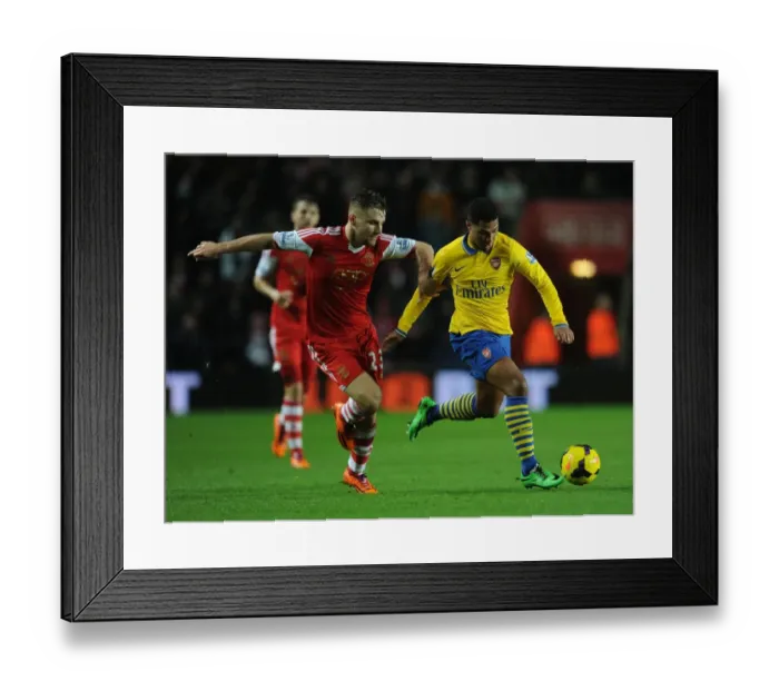 Framed Print : Serge Gnabry vs Luke Shaw: Intense Battle at Southampton's St Marys Stadium (Arsenal vs Southampton, Premier League 2013-14) Framed Print : Serge Gnabry vs Luke Shaw: Intense Battle at Southampton's St Marys Stadium (Arsenal vs Southampton, Premier League 2013-14)