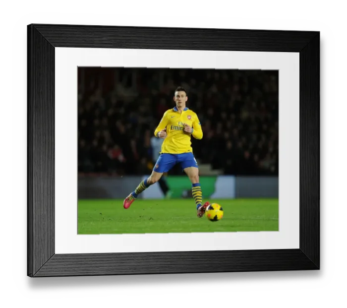 Framed Print : Laurent Koscielny Focuses in Southampton vs Arsenal Premier League Clash