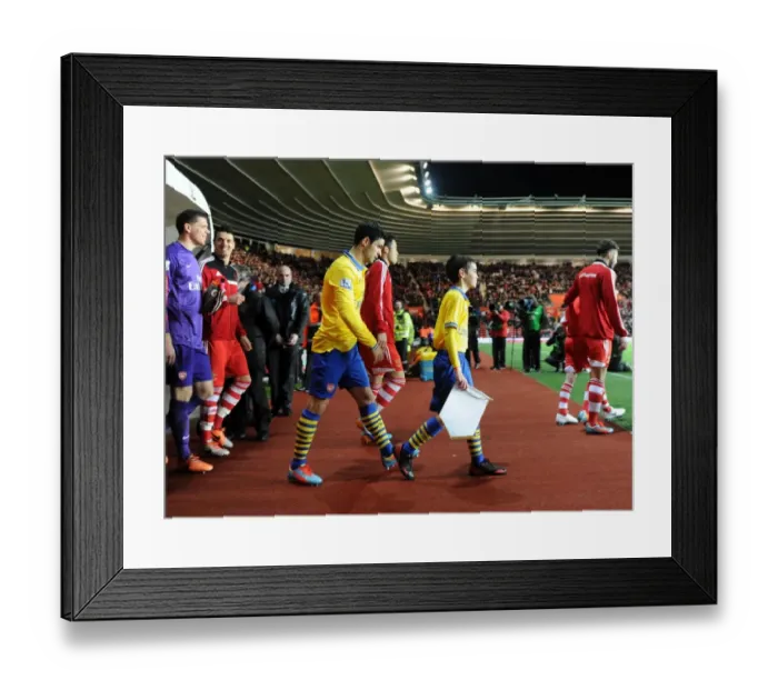 Framed Print : Mikel Arteta (Arsenal) with the mascot. Southampton 2: 2 Arsenal. Barclays Premier League Framed Print : Mikel Arteta (Arsenal) with the mascot. Southampton 2: 2 Arsenal. Barclays Premier League