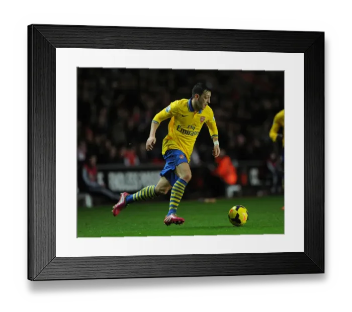 Framed Print : Mesut Ozil (Arsenal). Southampton 2: 2 Arsenal. Barclays Premier League. St. Marys Stadium, 29  /  1  /  14