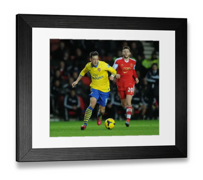 Framed Print : Mesut Ozil vs. Adam Lalana: Battle in the Premier League - Southampton vs. Arsenal (January 2014) Framed Print : Mesut Ozil vs. Adam Lalana: Battle in the Premier League - Southampton vs. Arsenal (January 2014)