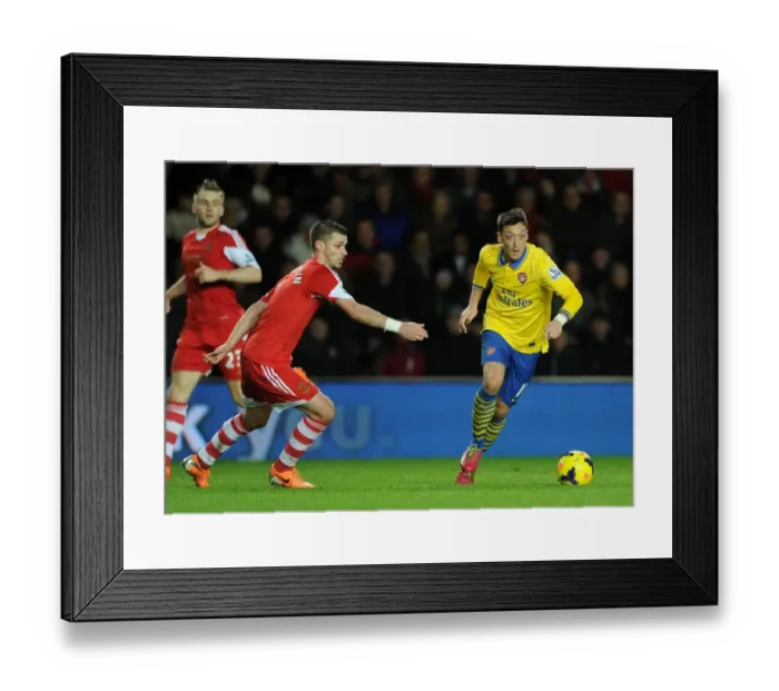 Framed Print : Mesut Ozil vs. Morgan Schneiderlin: Battle in the Premier League - Southampton vs. Arsenal (January 2014) Framed Print : Mesut Ozil vs. Morgan Schneiderlin: Battle in the Premier League - Southampton vs. Arsenal (January 2014)