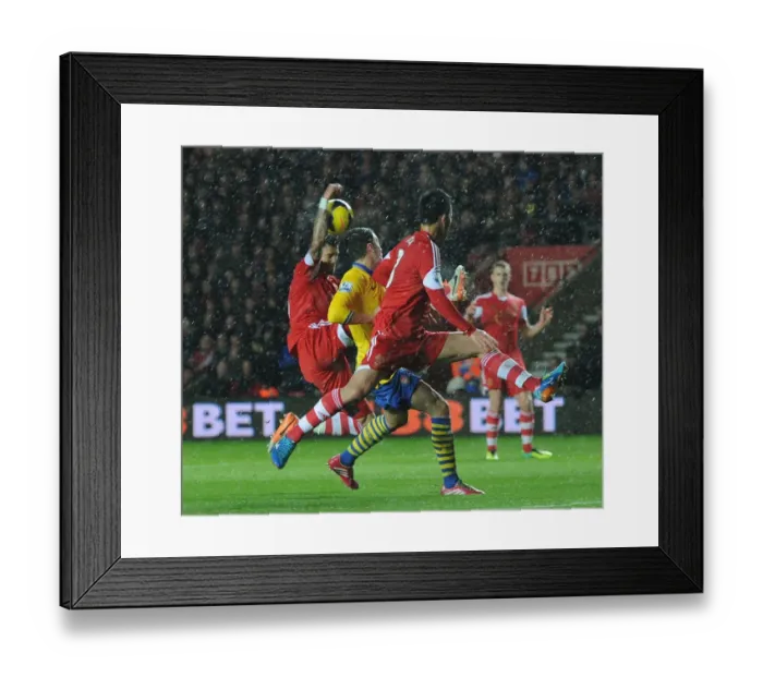 Framed Print : Mesut Ozil vs Jose Fonte: Controversial Handball Incident at Southampton vs Arsenal, Premier League 2013-14 Framed Print : Mesut Ozil vs Jose Fonte: Controversial Handball Incident at Southampton vs Arsenal, Premier League 2013-14