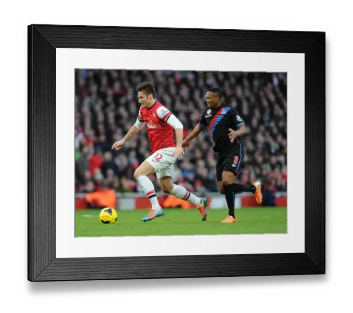 Framed Print : Arsenal's Olivier Giroud Faces Off Against Crystal Palace's Kagisho Dikgacoi in Premier League Clash