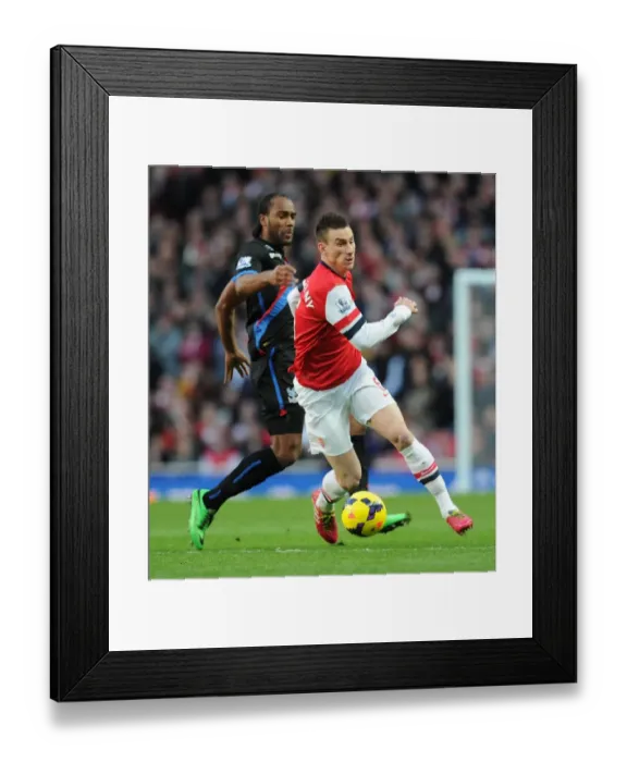 Framed Print : Arsenal's Koscielny Outmuscles Crystal Palace's Jerome in Premier League Clash Framed Print : Arsenal's Koscielny Outmuscles Crystal Palace's Jerome in Premier League Clash