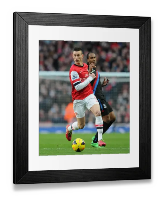 Framed Print : Arsenal's Koscielny Wins Ball from Crystal Palace's Jerome in Premier League Clash Framed Print : Arsenal's Koscielny Wins Ball from Crystal Palace's Jerome in Premier League Clash